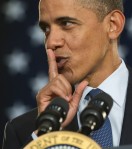 US President Barack Obama gestures for t